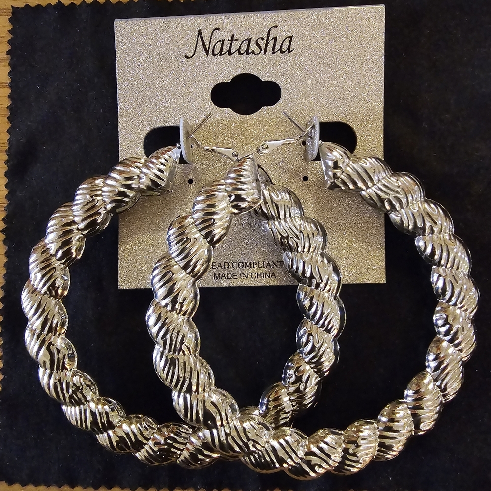 Large Silver colored Hoop Earrings by Natasha